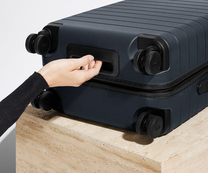 The Bigger Carry-On in Navy Blue