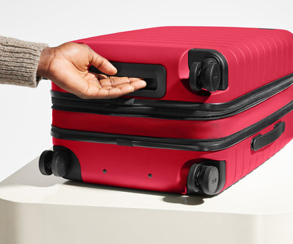 The Bigger Carry-On Flex in Cherry Red