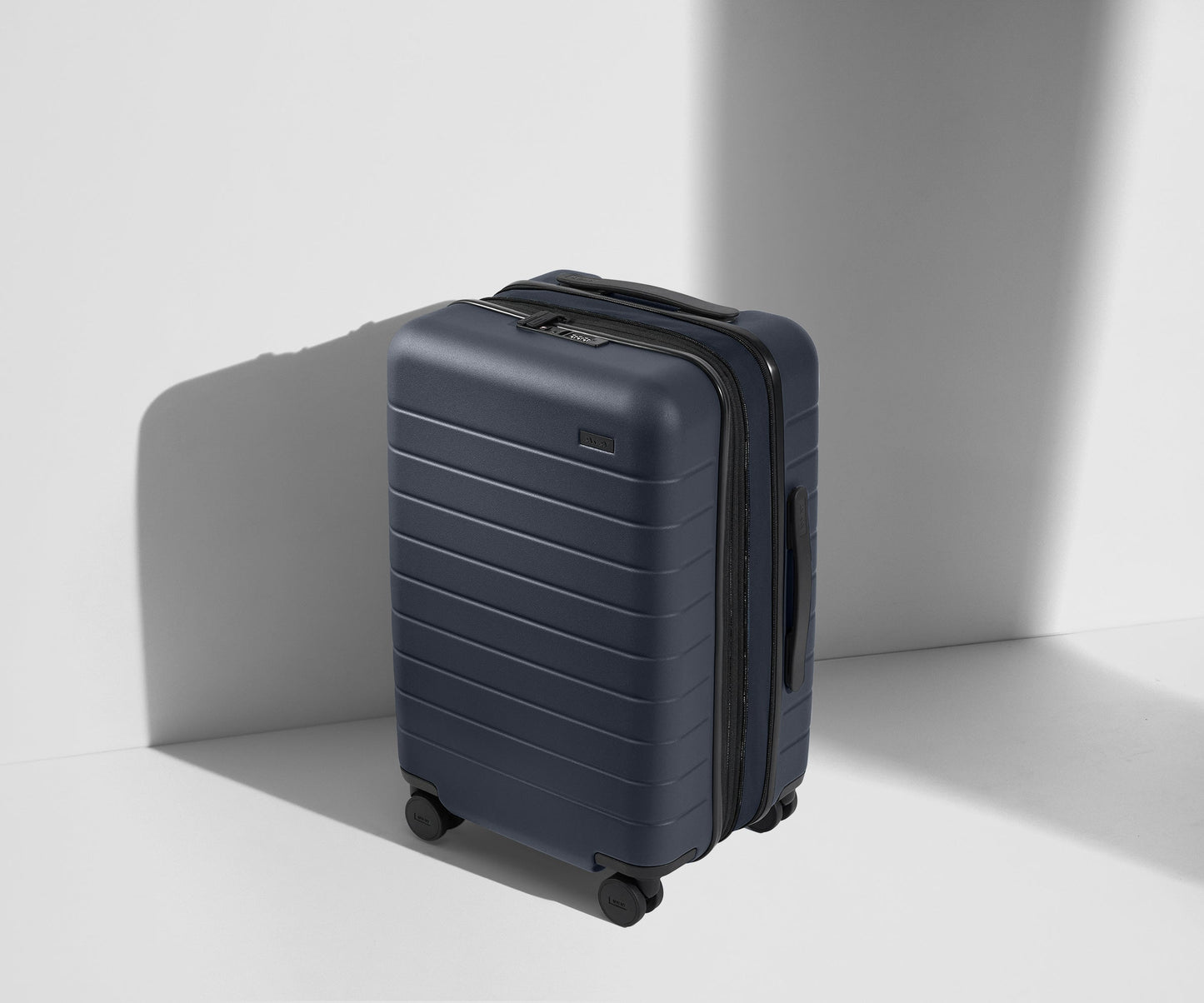 The Carry-On Flex in Navy Blue
